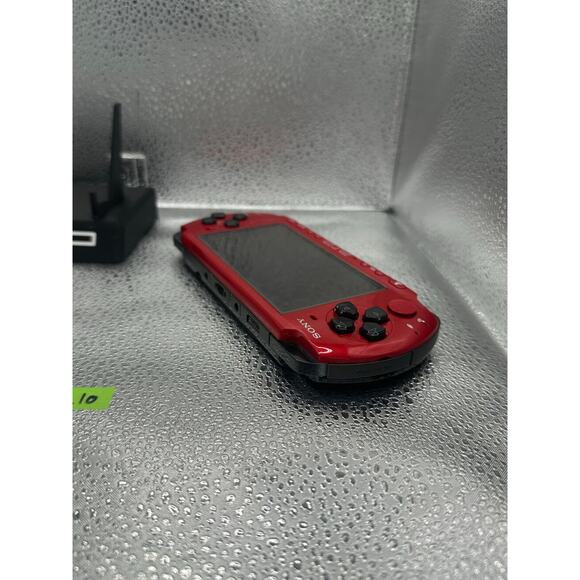 Red and black psp 3000 w/charger & new battery - Picture 7 of 7
